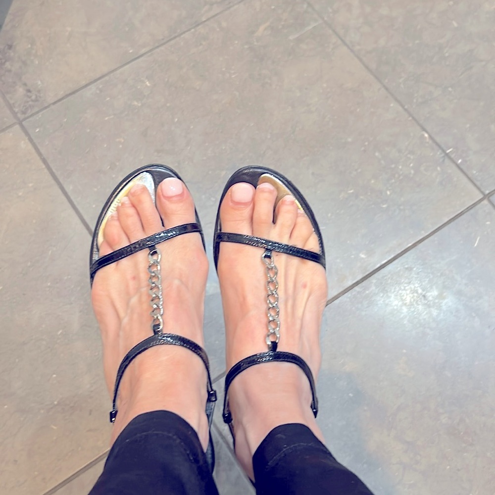Stuart Weitzman Black Patent Leather Silver Logo Hardware Sandals
Size 7 1/2